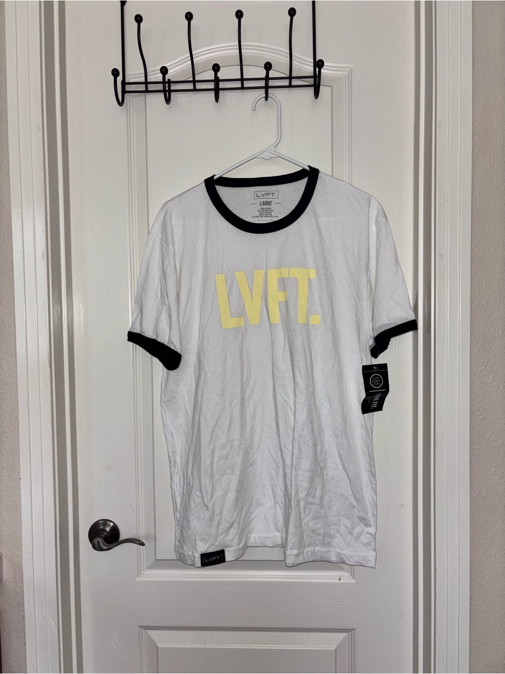 Men's White Ringer Tee with Yellow Logo